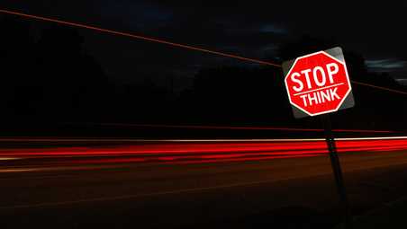 Stop think sign on the road